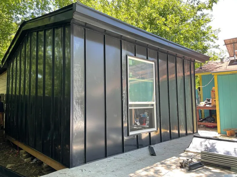 Black standing seam metal wall panels for Metal Roof Installation in Gonzales