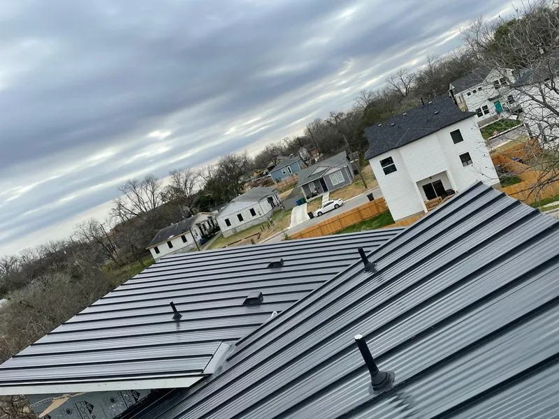 Standing seam metal roof panels with vents for Skylight Repair in Gonzales